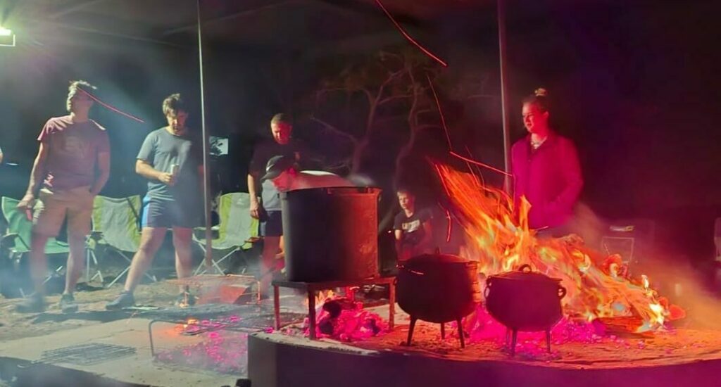 Cooking and conversation beside the campfire