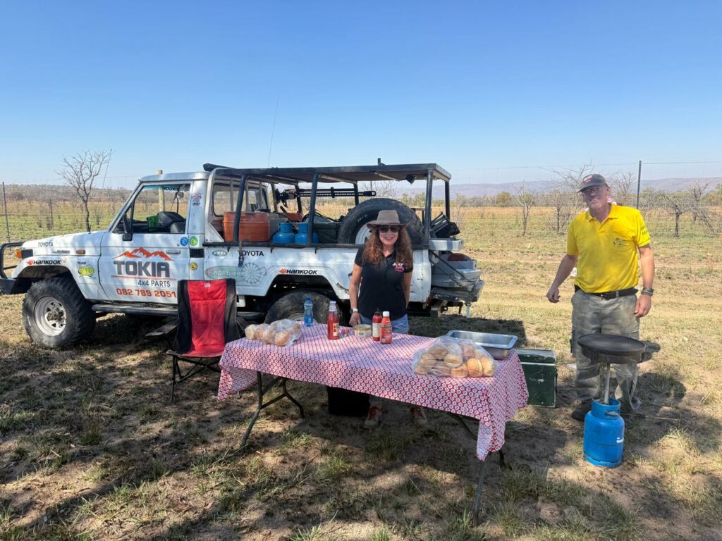 A refreshment stop beside the trail vehicles