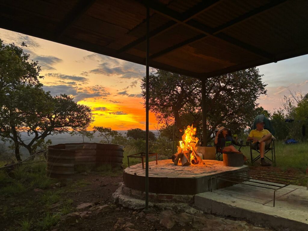The mountain campfire at sunset