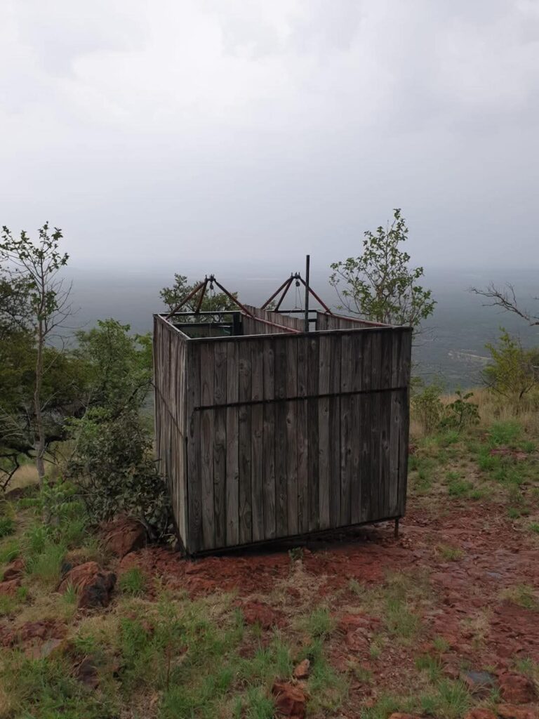 The basic bush shower with a mountain view
