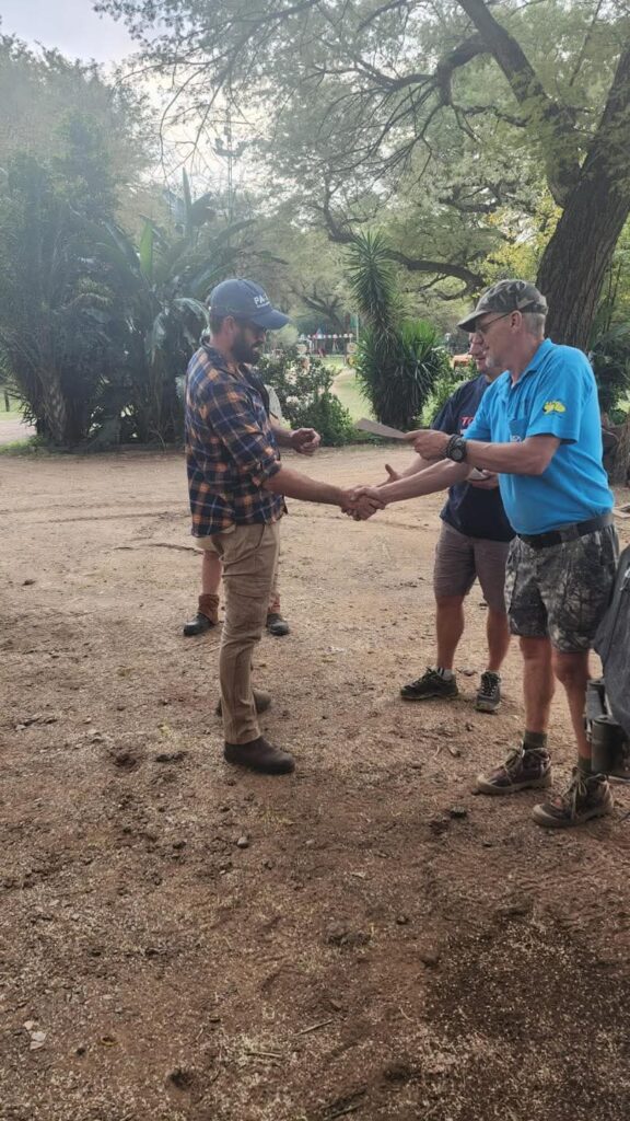 A participant receiving a completion certificate